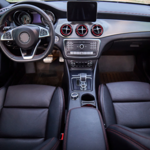 Inside moden car - luxury car interior elements - clean black seats after one detailing session at Jax Auto Spa - car detailing in Jacksonville Florida